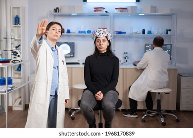 Researcher And Patient With Eeg Headset Looking At Virtual Display With Touchscreen, Virtual Reality Using Medical Inovation In Neurological Research Lab. Scientists Working With Healthcare Simulator.