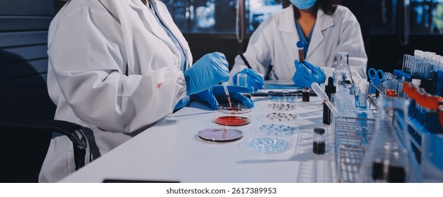 Researcher using a professional microscope