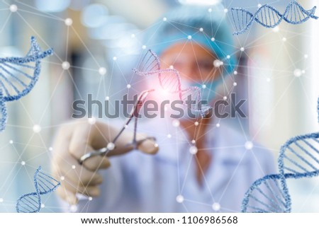 Researcher working with DNA on blurred background.