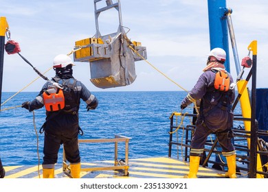 Researchers onboard - Duo collecting benthic organisms from research vessel - Powered by Shutterstock