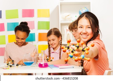 Researching chemical process with molecular model - Powered by Shutterstock