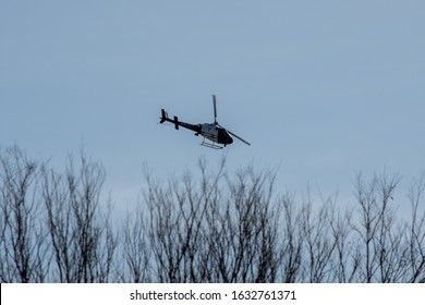 Reseda, California / USA -  January 31, 2020: LAPD Airship N665PD, a Eurocopter AS-350 AStar, assists officers from above during a high speed pursuit of a felony burglary suspect over the Valley.