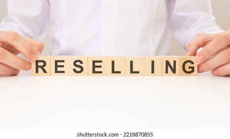 RESELLER Word Made With Wooden Building Blocks. Business And Sell Concept