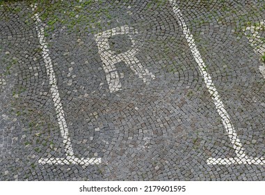 Reserved Parking Space On A Paved Parking Lot