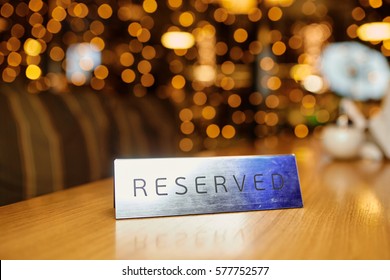 Reserved plate on a table in a restaurant
