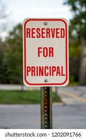 Reserved For Principal Parking Spot And Sign