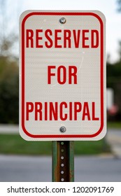 Reserved For Principal Parking Spot And Sign