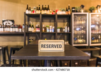 Reserved Sign On A Table In Restaurant