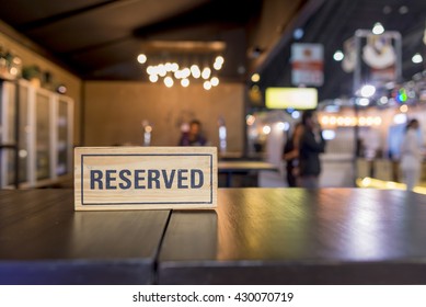 Reserved Sign On A Table In Restaurant