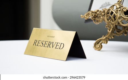 Reserved Sign, Reservation. On Table. Beige