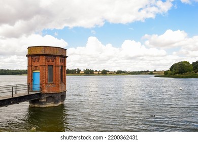 Reservoir with high water levels storing water supllies - Shutterstock ID 2200362431