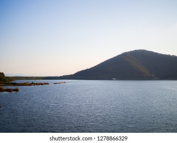 reservoir with mountains and evening sky at chiang Mai,thailand