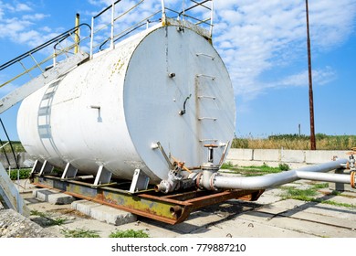 Reservoir For Sludge Of Oil Emulsion. Equipment At The Oil Field