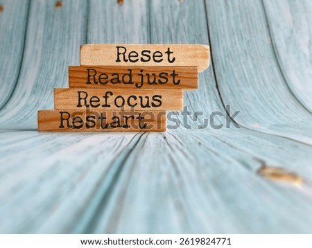 Reset readjust refocus restart text background. Stock photo.