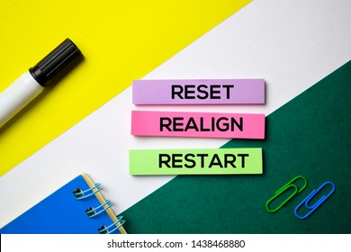 Reset. Realign. Restart Text On Sticky Notes With Office Desk Concept