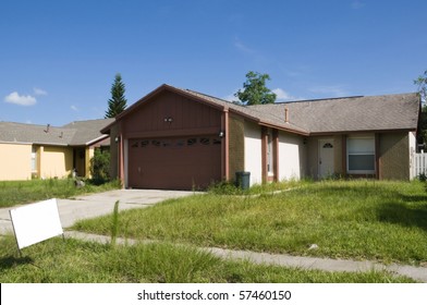 Resident abandoned due to foreclosure during recession with sign - Powered by Shutterstock