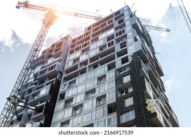 Residential apartment or business office building construction site with external wall facade insulating rockwool for thermal protection and economy. Modern heat thermo efficiency saving technology - Shutterstock ID 2166917539