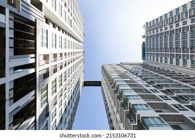 Residential apartment or condo buildings against blue sky