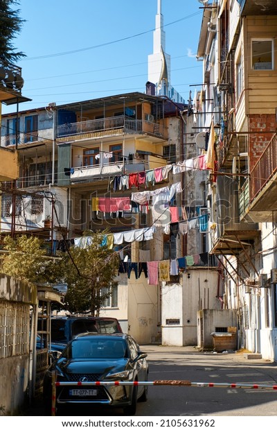Residential area in\
Georgia. The custom to hang out to dry clothes on the street.\
Batumi, Georgia -\
03.28.2021