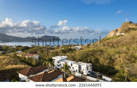 Residential area next to beach in San Juan Del Sur on morning sunny light