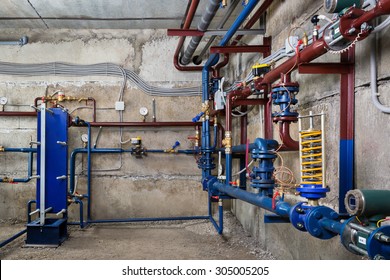 Residential Basement With Various Plumbing Fixtures.