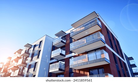 Residential  building. bottom view. Modern apartment building on a sunny day.  Facade of a modern apartment building. - Powered by Shutterstock