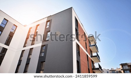 Residential  building. bottom view. Modern apartment building on a sunny day.  Facade of a modern apartment building.