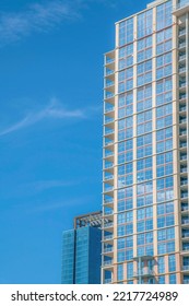 Residential Building Exterior Seen At A Housing Area In Downtown Austin Texas. City Skyline With Apartments Or Businesses Against A Cloudless Blue Sky Background.