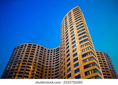 residential building project. a new urban neighborhood with high-rise multi-storey buildings in St. Petersburg. dense residential development with many apartments. affordable economy class housing - Powered by Shutterstock