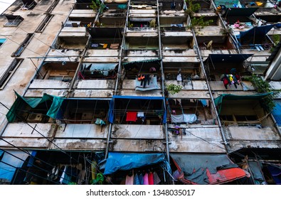 Residential Building Which Is Dilapidated, Old, Is A Residence Of Low Income People In The City, To Building And Metropolis Concept.