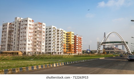 Residential Buildings Alongside City Road With Construction Work In Progress At Kolkata Rajarhat Area, India.