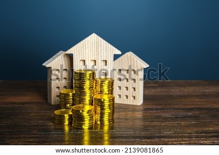 Residential buildings and coins stacks. Business and real estate. Rental income. Capitalization and value of assets. Property valuation. Budget. Tax collection. Construction industry