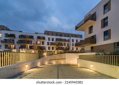Residential buildings in European city at night. Modern blocks of flats. Exit from the underground garage - Shutterstock ID 2145943381