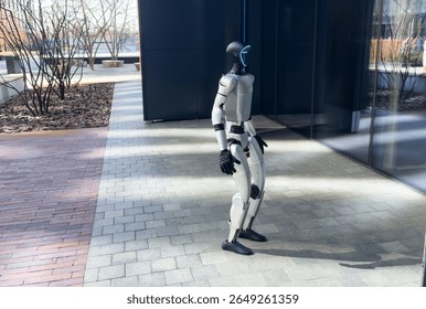  residential complex. Artificial intelligence machine walks. Robot spend time 