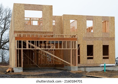 A Residential Duplex House Construction Project Showing The Plywood Roof And Oriented Strand Board Wall Sheathing Frame Industry Plank