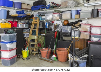 Residential garage full of junk and storage.  - Shutterstock ID 370757162