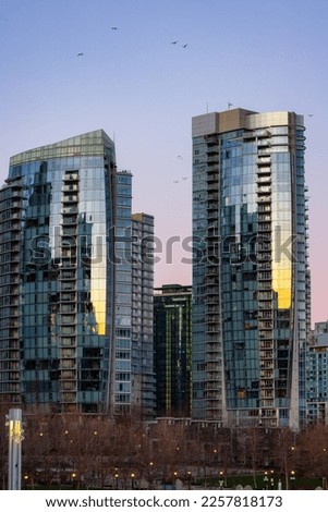 Residential Highrise Apartment Buildings in Coal Harbour, Downtown Vancouver, British Columbia, Canada. Winter Sunrise