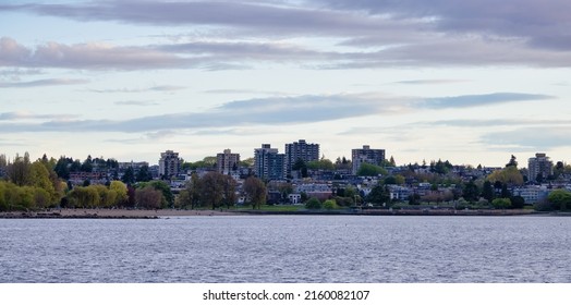 Residential Home Buildings On The West Coast Of Pacific Ocean. Kitsilano, Vancouver, British Columbia, Canada. Sunset Sky