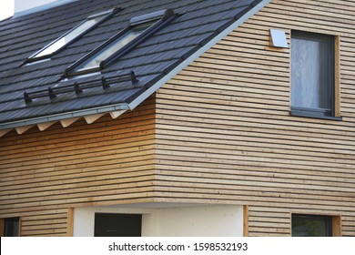 Residential Home With Wooden Facade