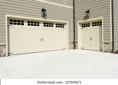 Residential House Three Car Garage Doors