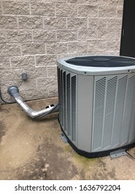 Residential Hvac Unit Standing On Conrete Slab