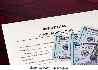 Residential Lease Agreement And Cash Money. Rental Contract, Eviction And Housing Crisis Concept.