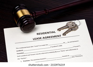 Residential lease agreement contract and gavel. Real estate law and rental dispute concept. - Shutterstock ID 2153976219