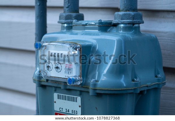 Residential\
natural gas meter measuring gas\
consumption.