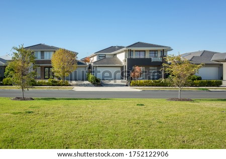 Residential neighborhood street with some modern Australian homes. The beautiful environment in Melbourne's suburb. VIC Australia.