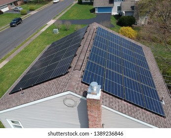 Residential Solar Panels Installed On A Home Roof