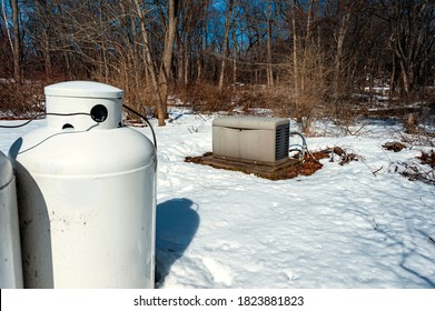 Residential Standby Generator Installed On A Concrete Pad