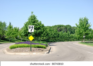 A Residential Street With A Landscaped Median