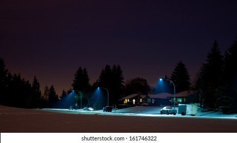 Residential Street At Night In The Winter.