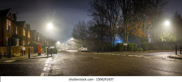 Residential suburb in the foggy night, London - Powered by Shutterstock